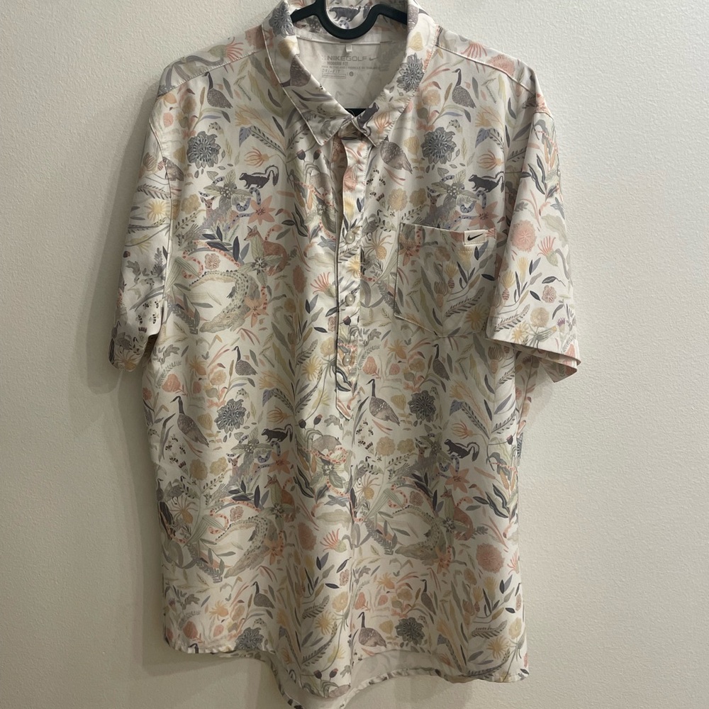 Nike animal print golf shirt. Fits like M/L
